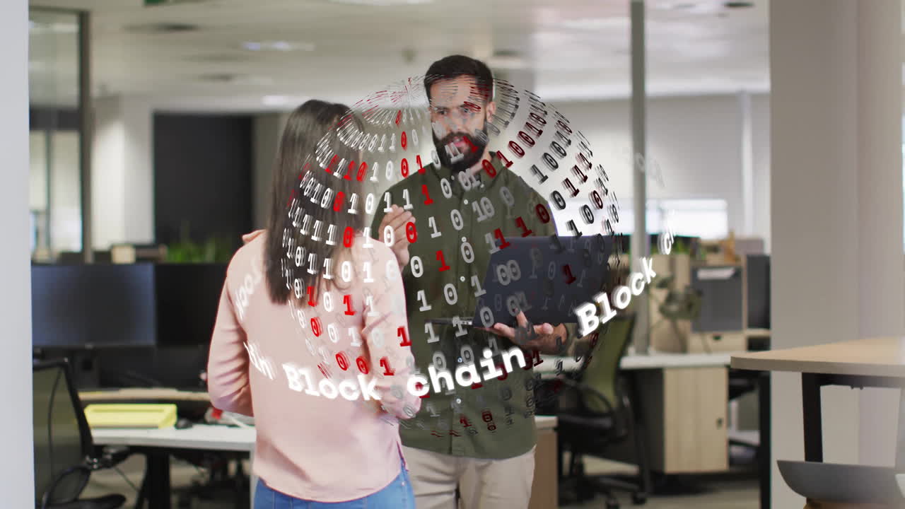 Blockchain data animation over two people discussing in modern office setting
