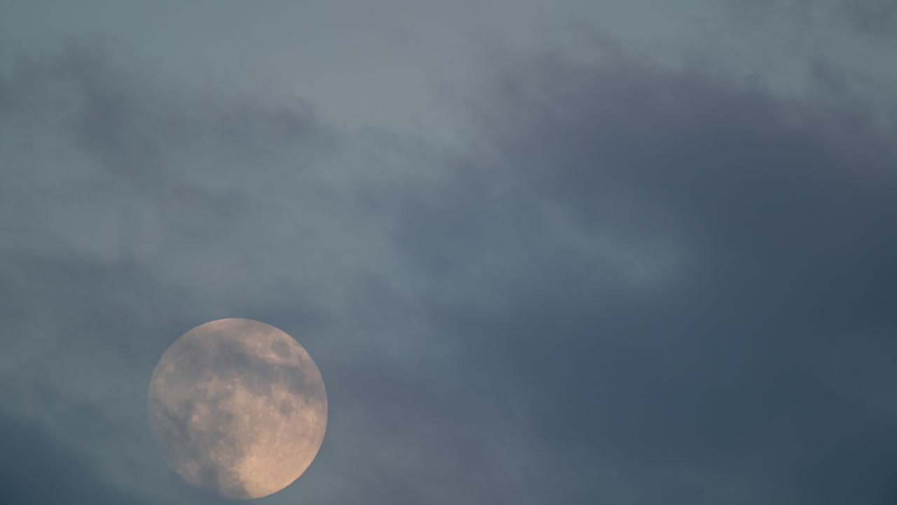 Moon peeking through the clouds
