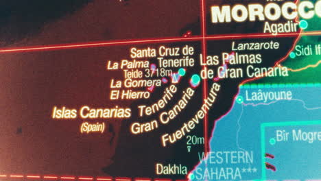 close-up of a digital map highlighting the canary islands, morocco, and western sahara