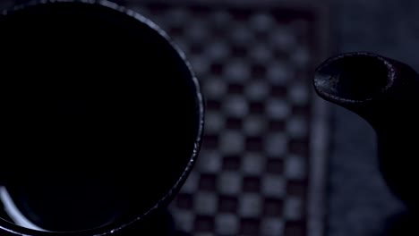 Extreme-close-up-of-a-beautiful-oriental-cast-Iron-teapot-and-cup