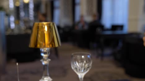 a couple toasting with champagne in a luxurious restaurant in intimate atmosphere