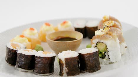 various sushi served on plate