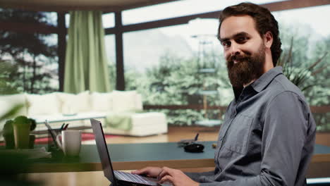 Rich-adult-seated-at-desk-in-his-expensive-lodge