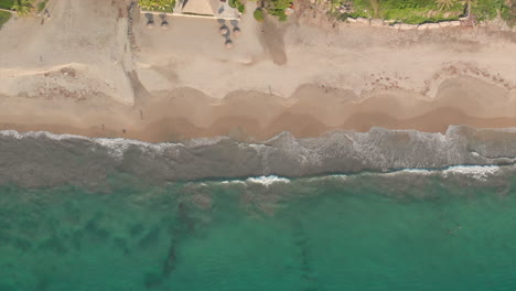 aerial: pan over the beach