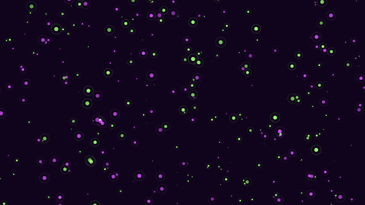 검은색 배경 에 떠다니는 초록색 과 보라색 점 들 의 매혹적 인 원형 패턴