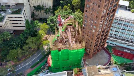 High-Rise-Building-Construction-with-Bamboo-Scaffolding-in-Hong-Kong,-China