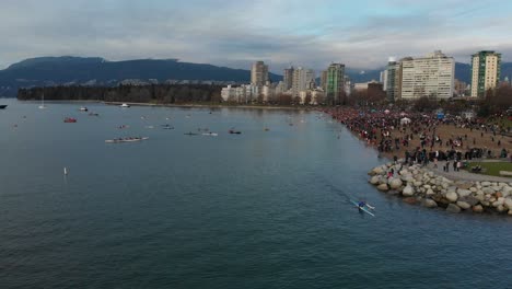 Various-drone-shots-at-English-Bay-near-downtown-Vancouver,-BC-during-Polar-Bear-2019-event