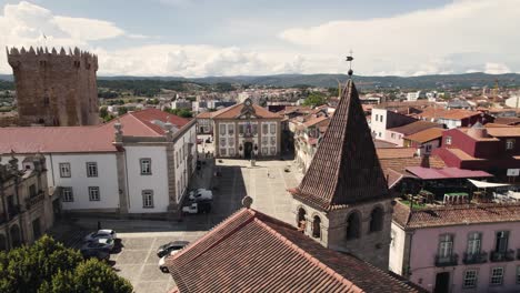 aerial rotation left to right reveal medieval chaves downtown, old buildings rooftops