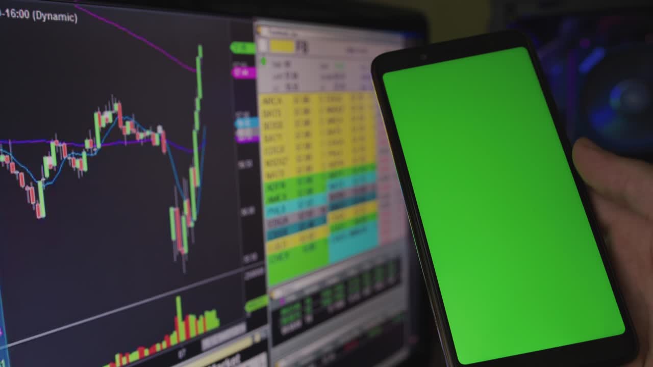 Mobile phone with green screen, background of digital exchange of crypto money future price action prediction. Stock market concept.