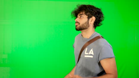 indian-tourist-walking-on-road-with-green-background---green-screen