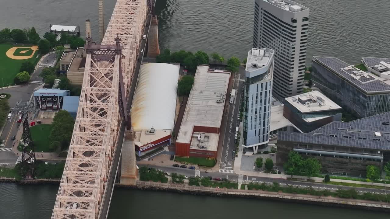 Brooklyn Bridge spans over East River in New York during a drone view
