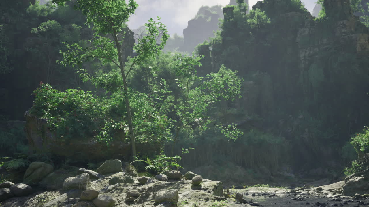 Lush green landscape with rocks and flowing water in a peaceful natural setting