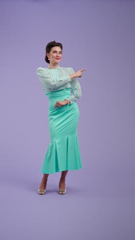 woman in elegant retro-style outfit posing against a purple background