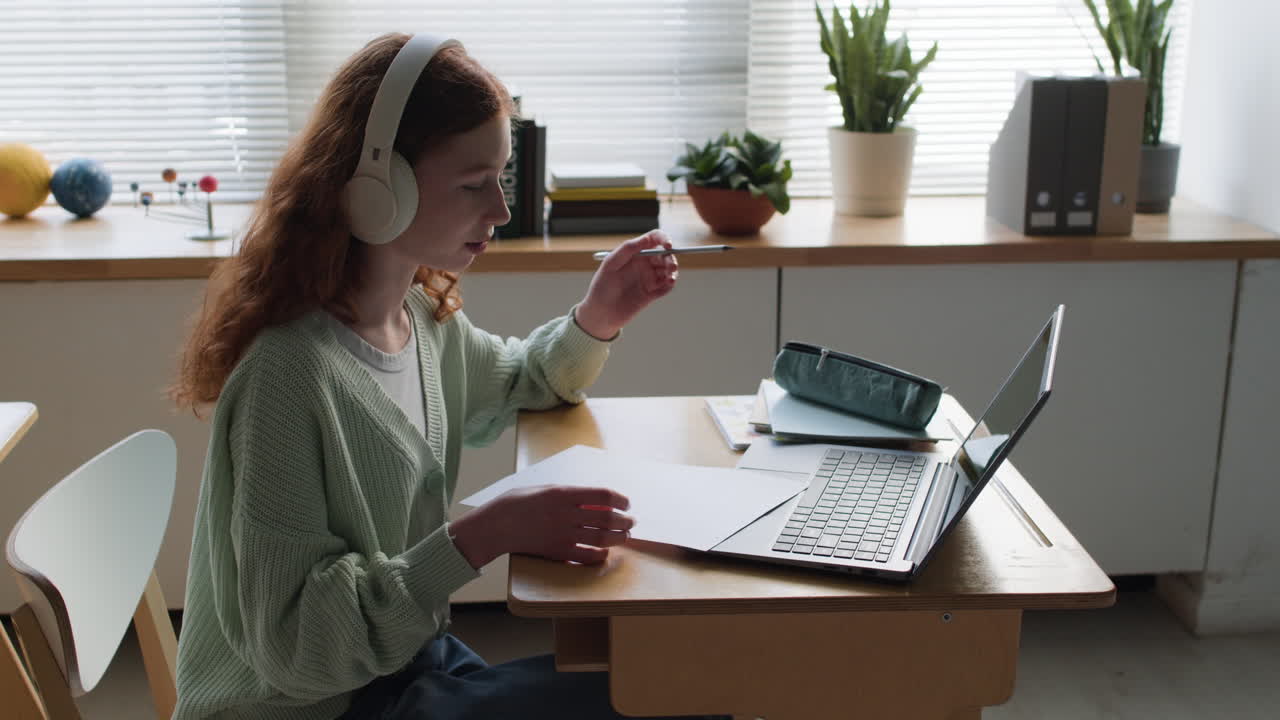 Teenage Girl Doing Online Schoolwork