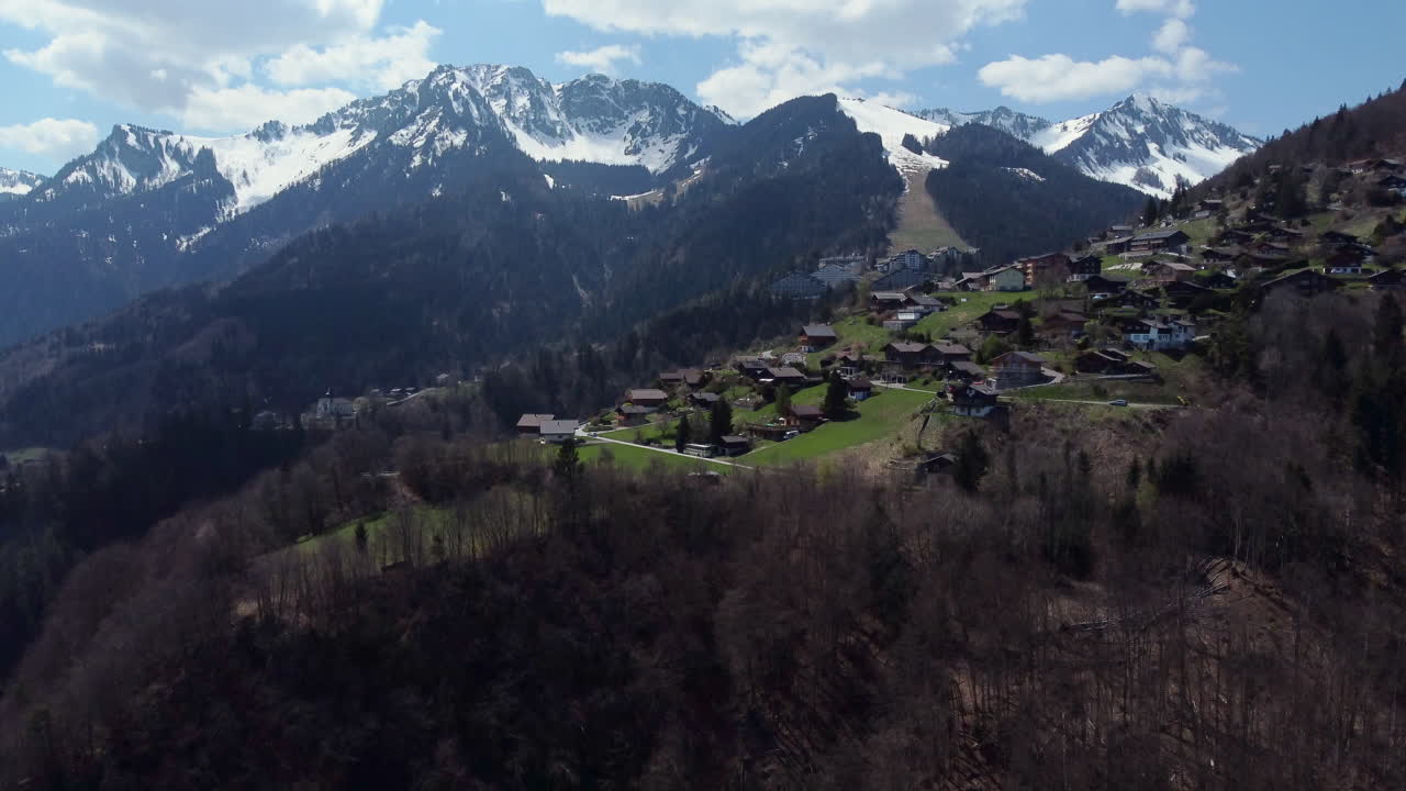 Aerial View of a Charming Mountain Village in the Swiss Alps
