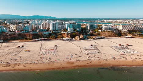 coastal view of portugal showing vibrant beach life during day