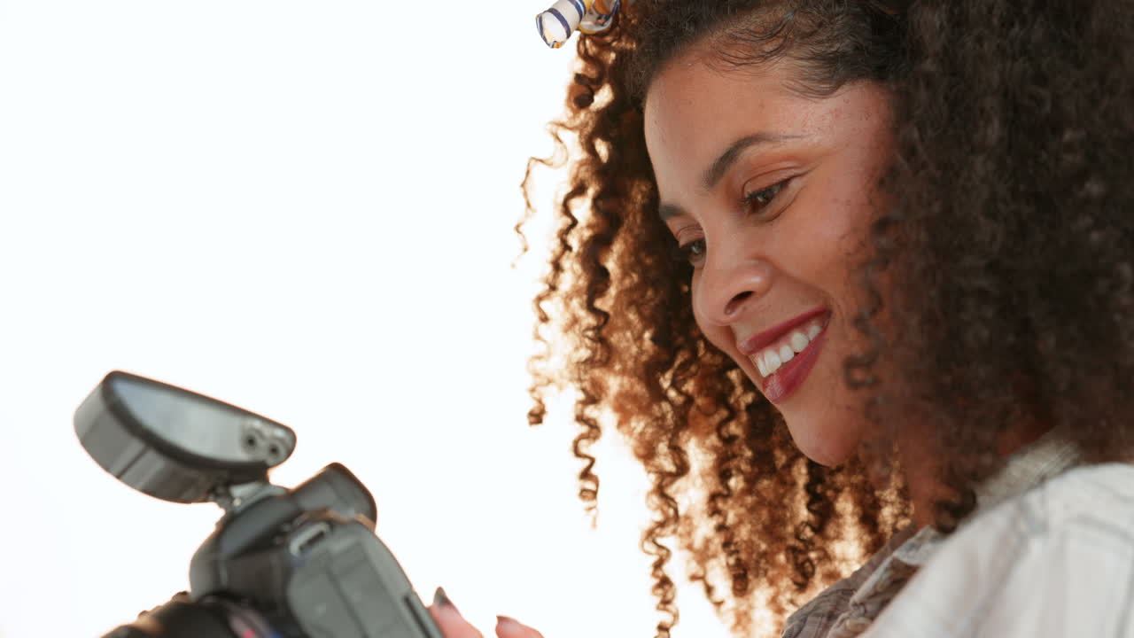 mujer fotógrafa, cámara