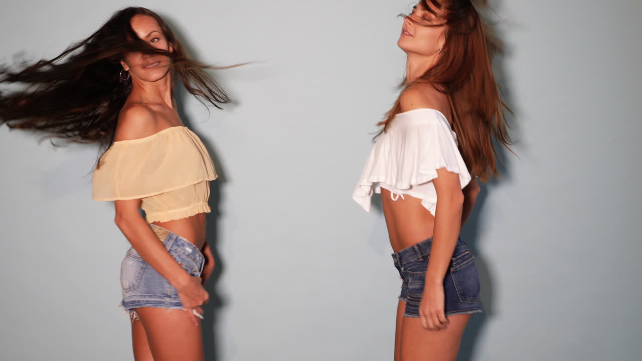 Two Women Posing in Summer Fashion