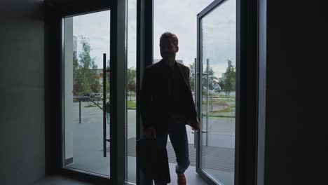 Businessman Leaving Office Building