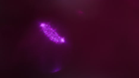 abstract purple background with blinking bokeh lights