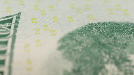 macro shot of folded american twenty dollar bill rotating slowly