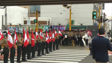 peruvian military band marching in a city street parade