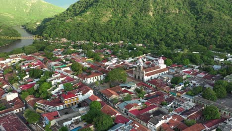 aerial view, honda, colombia, scenic valley and colonial town in green landscape of tolima region, drone shot