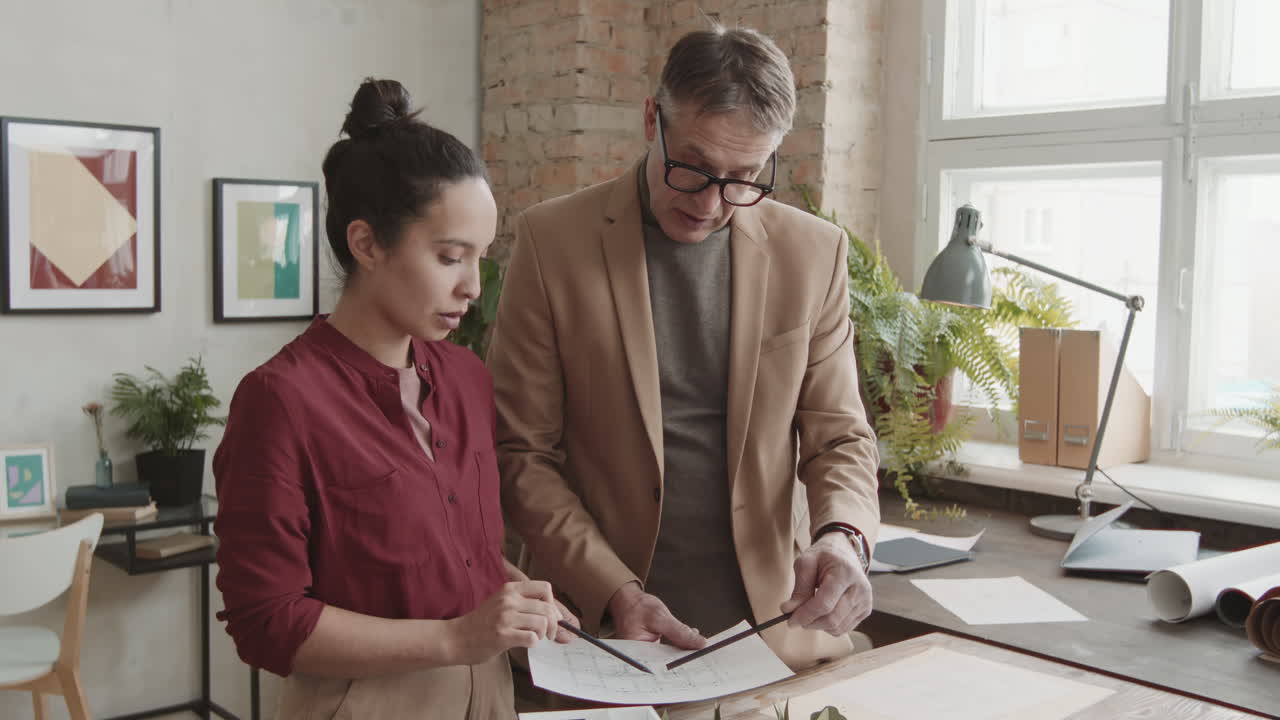 Professional Architects Discussing House Design