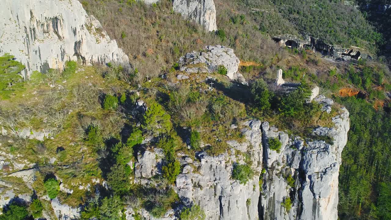 church and religion cross symbol on top of majestic cliffs, Motovun, Croatia