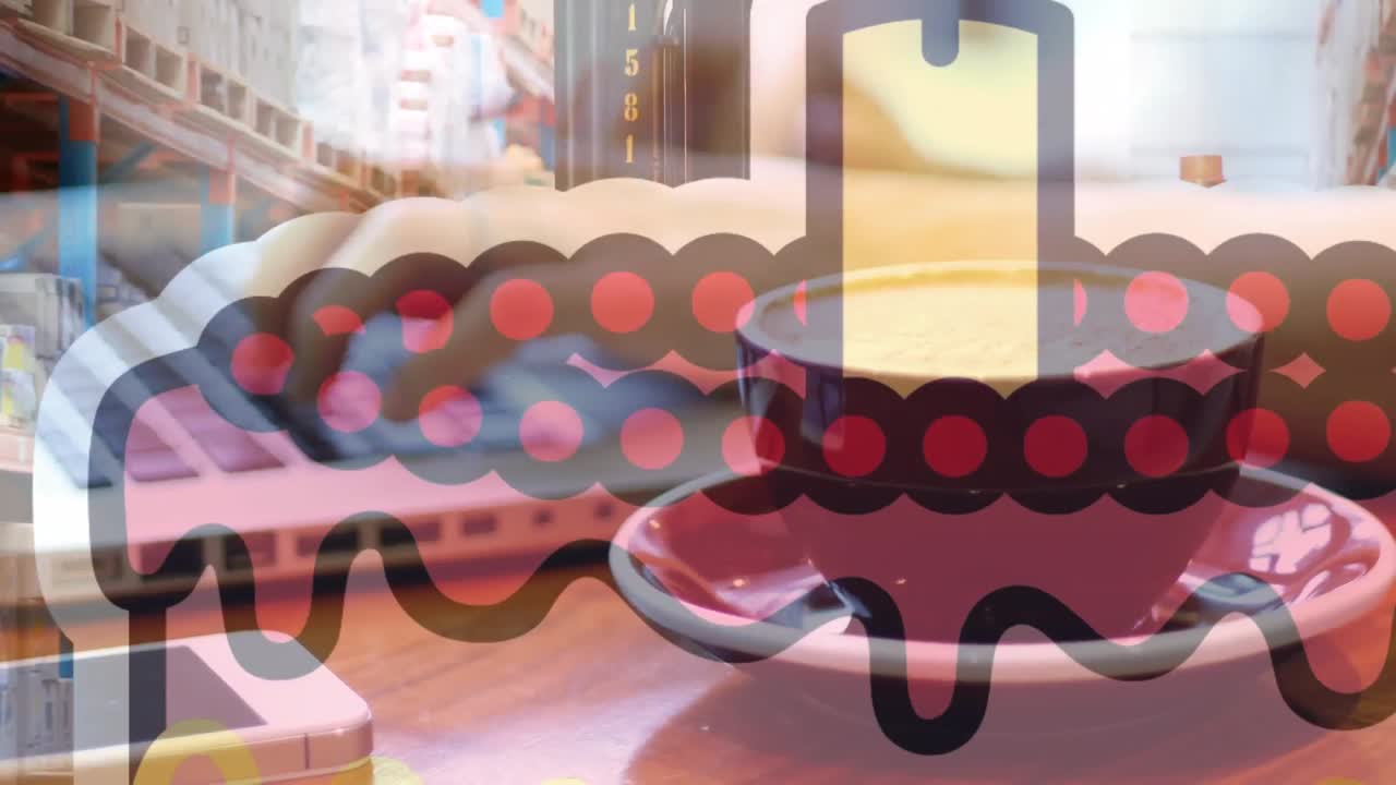 노트북에서 타이핑하는 손과 창고 위의 생일 케이크의 애니메이션.