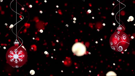 animación de puntos de luces y bolas de navidad sobre fondo negro