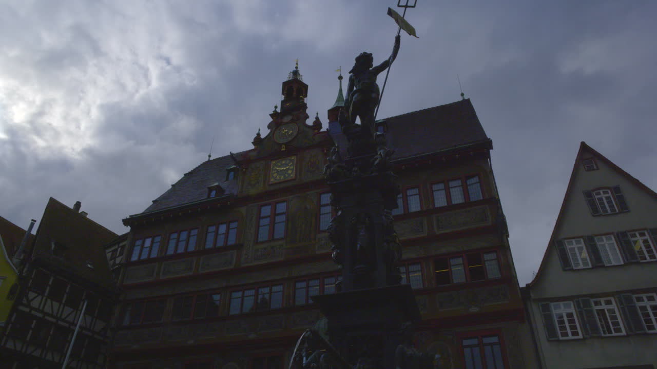 Moody statue in Am Markt, inside the main square of Market Place in the old town of Tubingen Germany, Europe