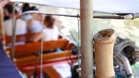 bamboo post on a boat in a canal