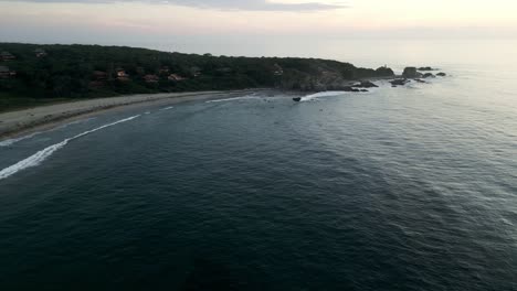 Aerial-Of-La-Punta-Beach-In-Puerto-Escondido-Mexico-Oaxaca