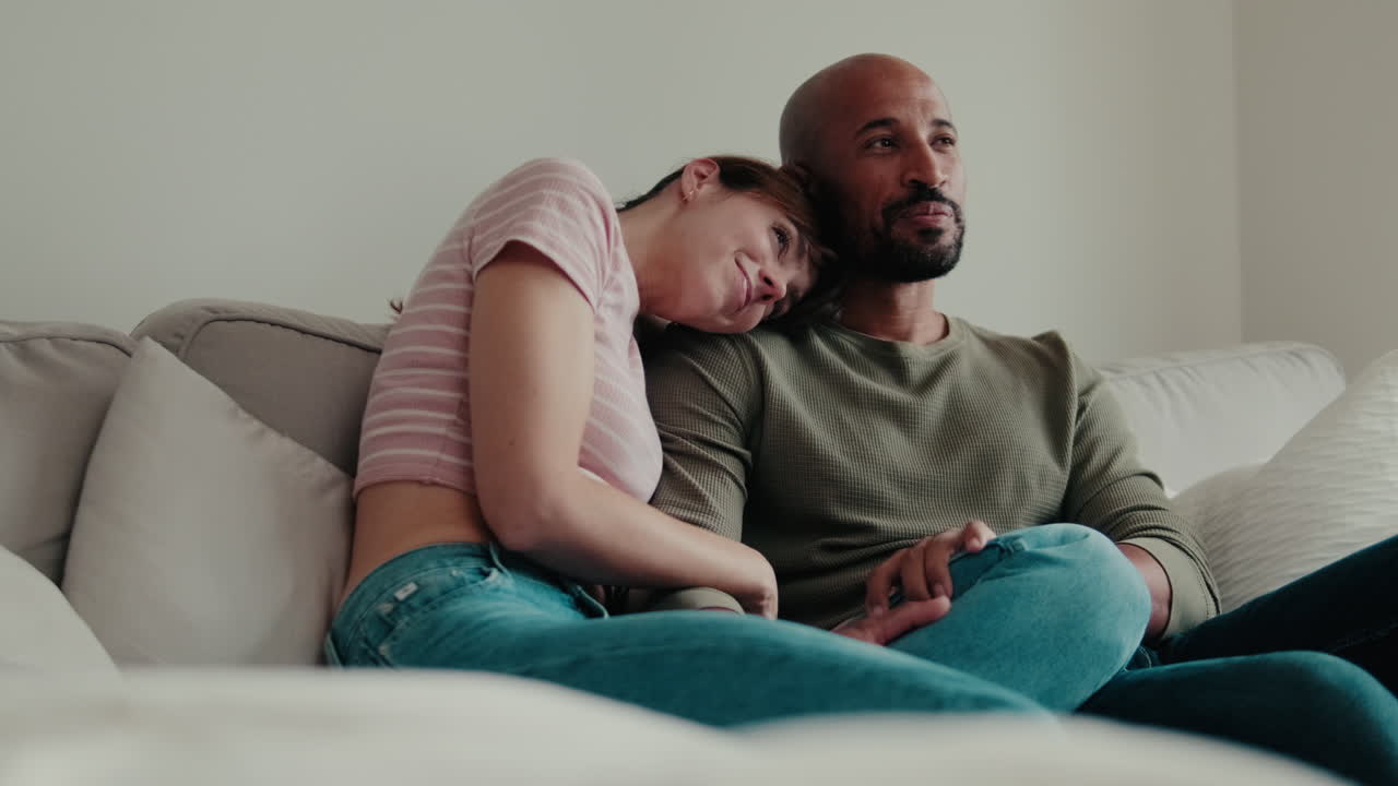 Happy Couple Relaxing Together At Home