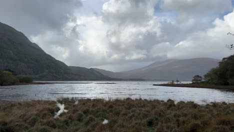Muckross-Lake-with-waves,-overcast-sky,-during-a-windy,-stormy-day
