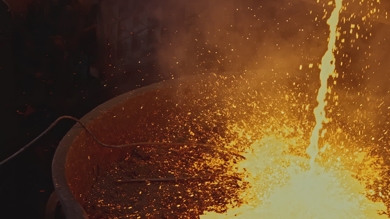Molten Metal Pouring into a Crucible