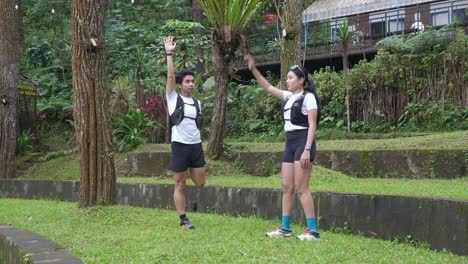 couple stretching outdoors
