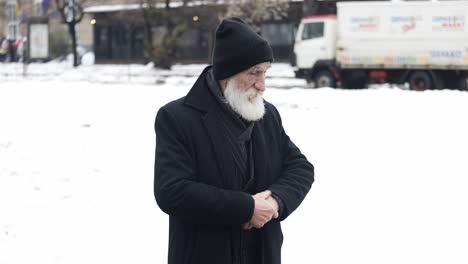 two bearded men navigate a snowy landscape reflecting on age this video depicts two bearded men one elderly and one middleaged navigating a snowy landscape symbolizing reflection on age and time