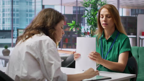 human resources employees evaluating job applications and cvs after interviews