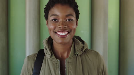 portrait of confident african american woman smiling proud