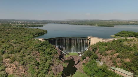 drone footage of a dam wall reverse dolly zoom effect