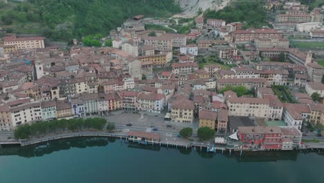aeriel view of lake iseo at sunrise, the city of lovere which runs along the lake,bergamo italy.