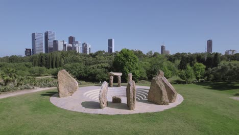 Building-large-stones-on-top-of-each-other-like-Stonehenge-inside-Rock-Garden-Israel---rising-up-shot