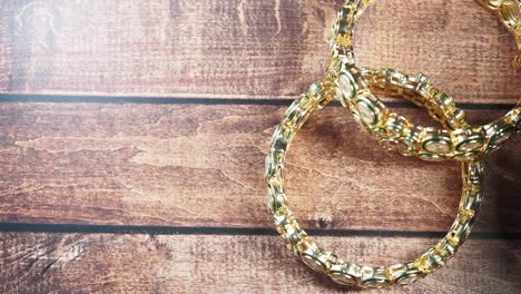 gold bangles with gems