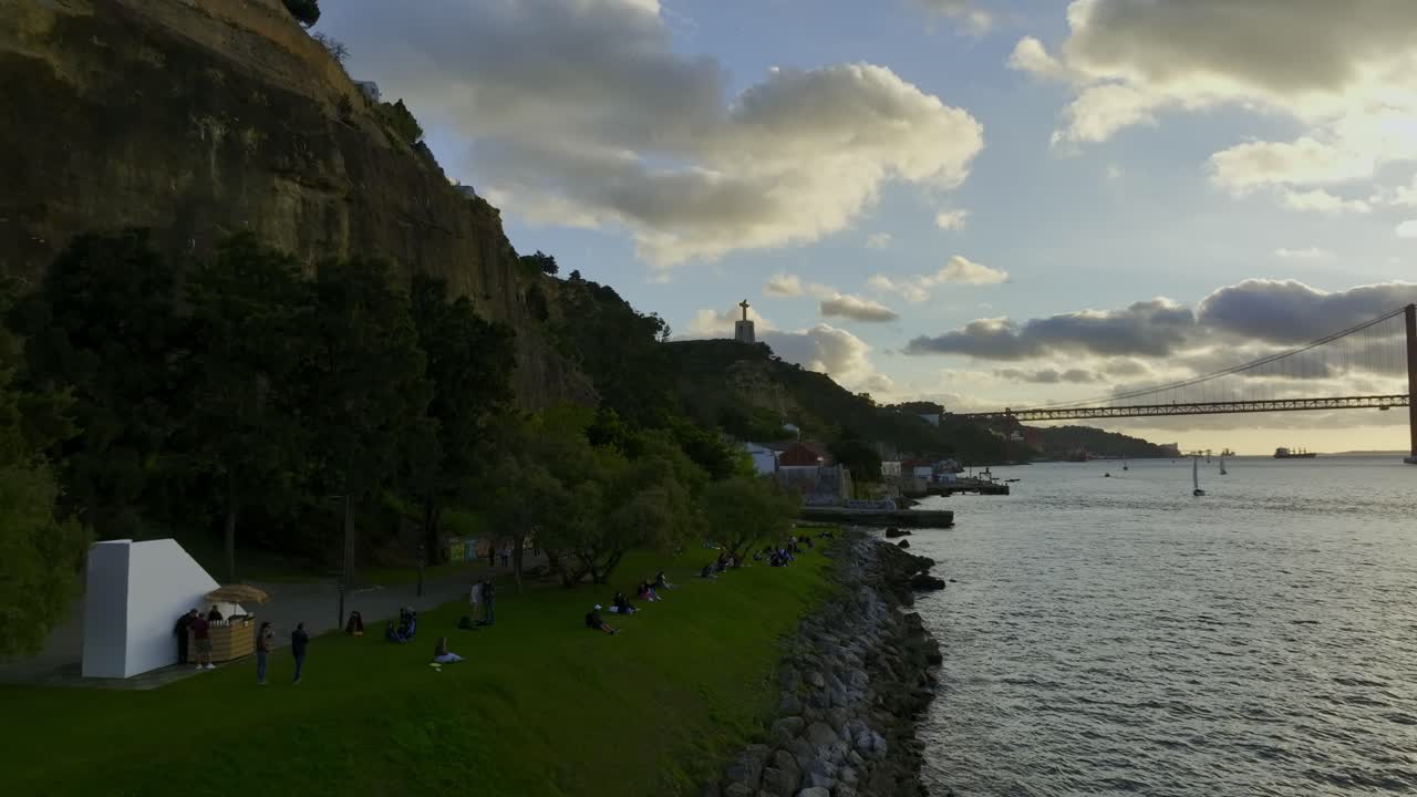 Drone shot from park by coastline in Almada
