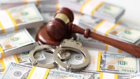 money, gavel and handcuffs