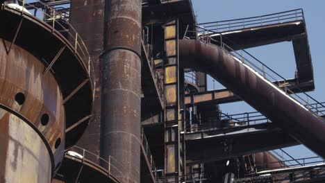 the desolate and bleak scene of an abandoned factory