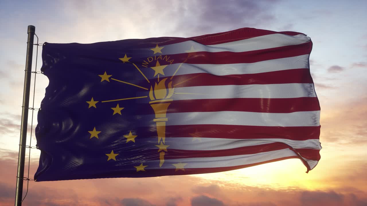 bandeira de indiana e dos estados unidos no mastro da bandeira. bandeira mista dos estados unidos e de indiana agitando no vento