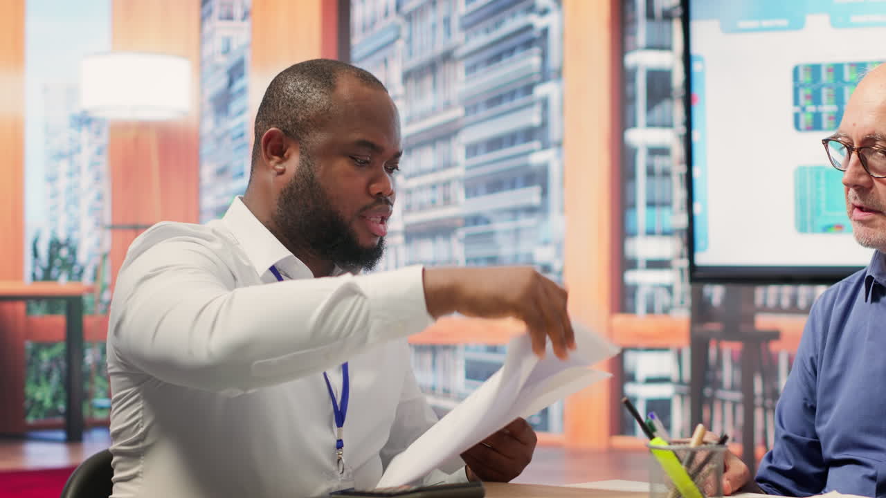 Elderly people discussing with financial expert about suitable retirement plans